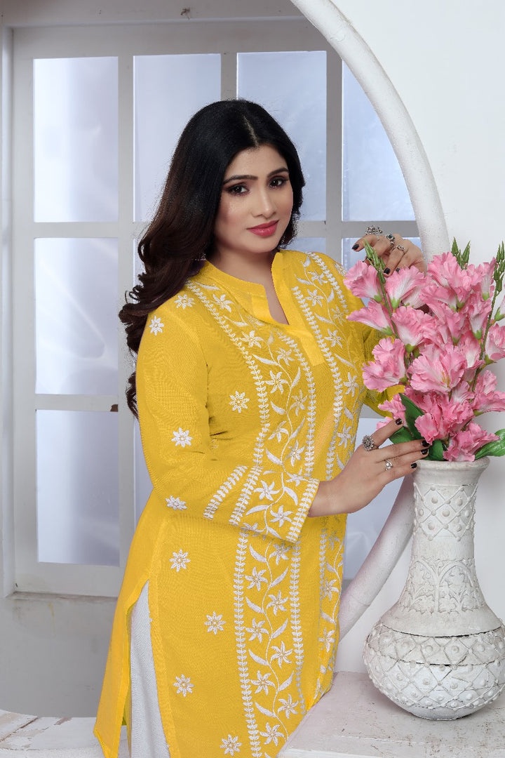 Avira – A blend of tradition and modernity Rayon Embroidery Top Kurti Yellow